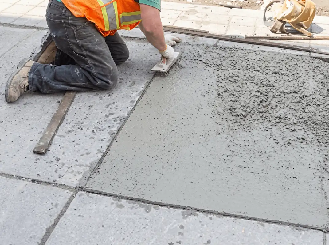 Professional repairing a concrete floor in Fort Collins, CO
