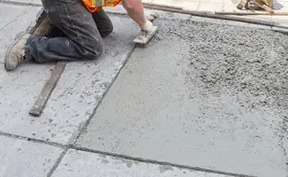 Professional repairing a concrete floor in Fort Collins, CO