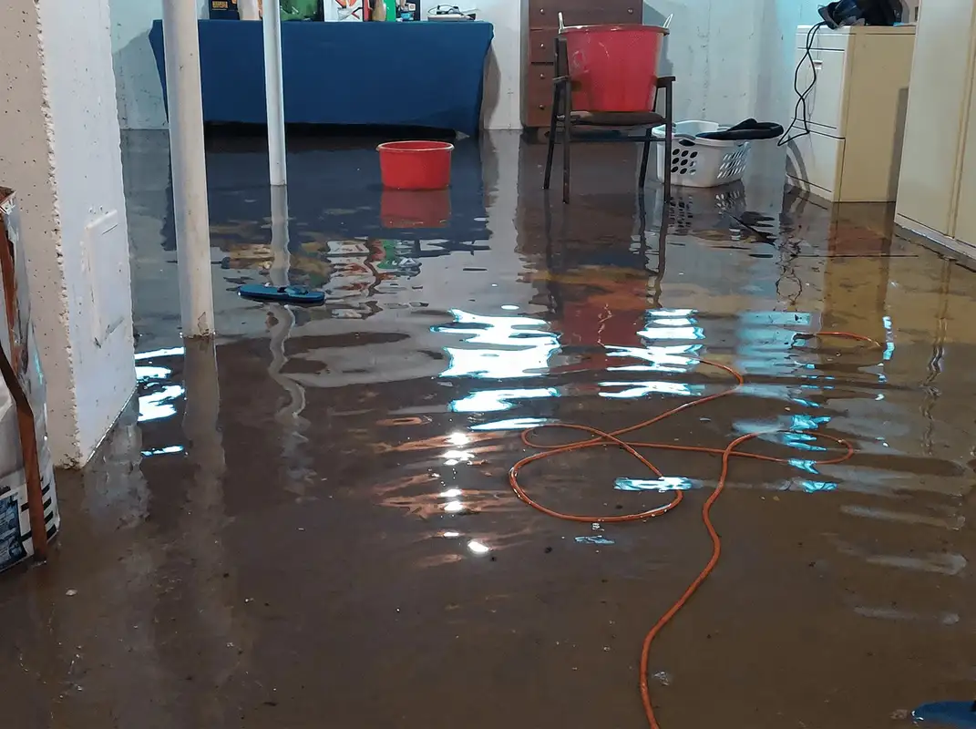 Basement with boiler, cabinets and washing machine completely flooded in Fort Collins, CO