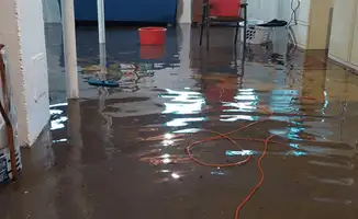 Basement with boiler, cabinets and washing machine completely flooded in Fort Collins, CO