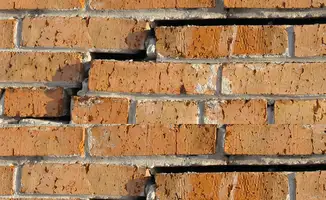 Brick wall with serious structural damage in Fort Collins, CO